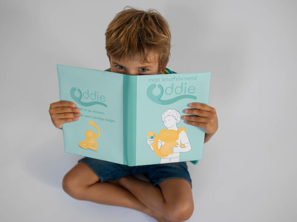 Mock-up kind met bijhorend boekje